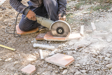 Paving stone cutting with hand power tools
