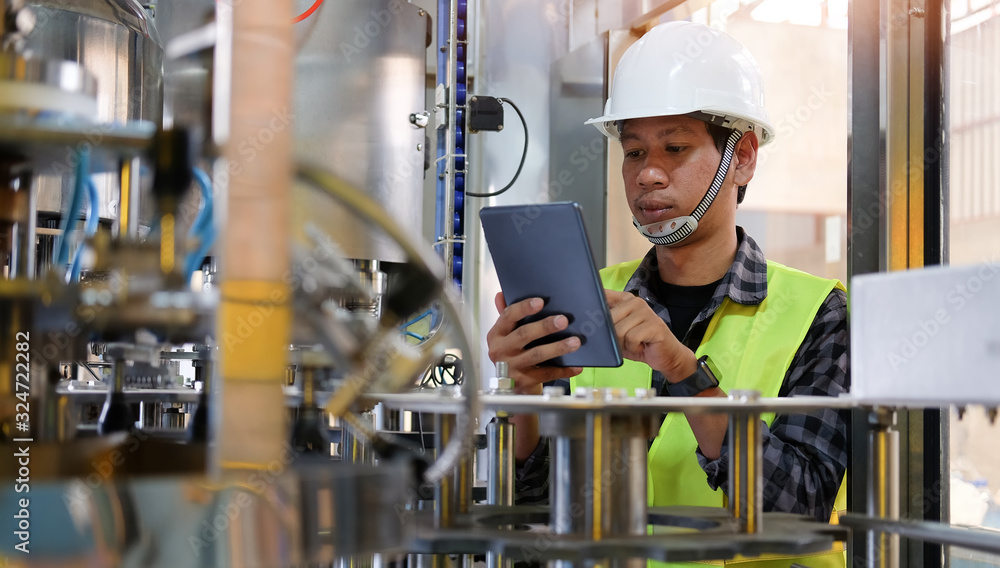 Poster cropped shot view manager technical industrial engineer working and control robotics with monitoring