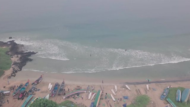 Fishing village on Indian Ocean near Varkala, India. Aerial drone view