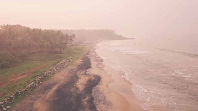 Sandy beach in Kerala, India. Static aerial drone view