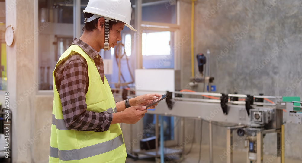 Poster cropped shot view manager technical industrial engineer working and control robotics with monitoring