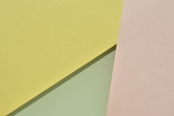 pastel ,soft two tone color of pink and yellow green,  paper as texture fashion background, flat lay