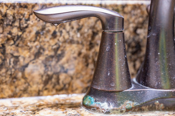 corroded and rusted rubbed oil bronze bathroom faucet