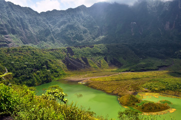 Fototapeta na wymiar lake in mountains with green view of plants in West Java