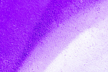 Beautiful bright colorful street art graffiti background. Abstract creative spray drawing fashion colors on the walls of the city. Urban Culture, black ,blue, purple , violet , neon texture