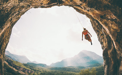 Rock climber hanging on a rope.