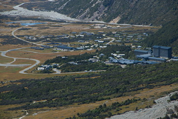 View of Mount Cook Village from track to Sealy Tarns in Mount Cook National Park on South Island of...