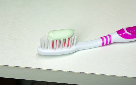 Toothbrush with toothpaste for cleaning teeth. Hygiene brush your teeth. Compliance with hygiene rules brushing your teeth every day. Healthy teeth. - Powered by Adobe