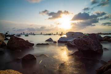 View of Da Nang rocks beach at sunset.