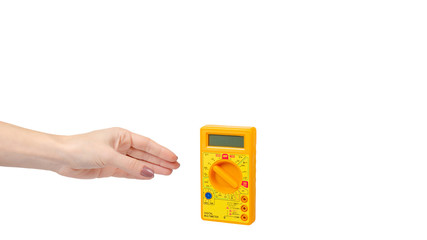 Yellow plastic multimeter, electric tester tool. Isolated on white.