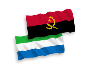 Flags of Angola and Sierra Leone on a white background