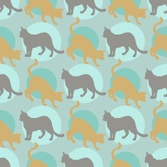 Seamless pattern with cats silhouettes on a blue background