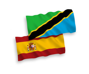 Flags of Tanzania and Spain on a white background