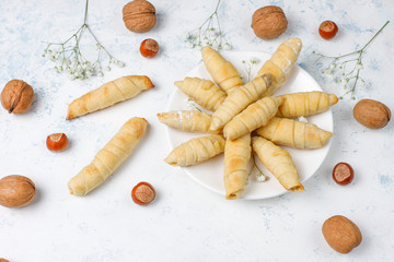Fototapeta na wymiar Traditional Azerbaijan holiday Novruz cookies mutaki on white plate on light background
