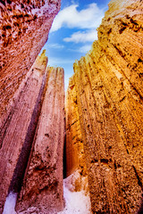The dramatic and unique patterns of Slot Canyons caused by erosion of the soft volcanic Bentonite...