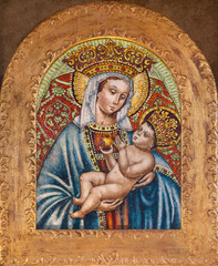 FERRARA, ITALY - JANUARY 30, 2020: The  ceramic Madonna in church Basilica di San Giorgio fuori le...