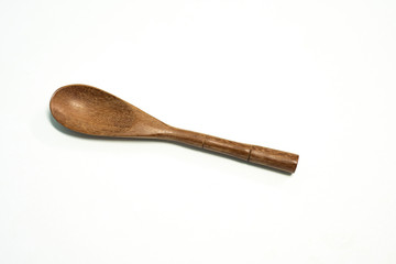 Close up spoon wood on white background.