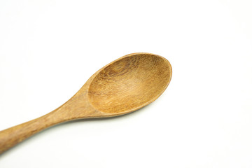 Close up spoon wood on white background.