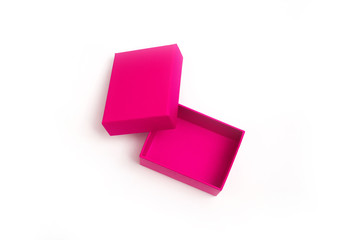 Pink open empty box with a lid on a white background. Packaging. Gift.