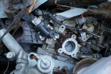 Fototapeta na wymiar Junk yard full of car's part , engine , body.