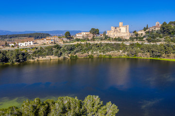 Fototapeta na wymiar Aerial view of the foix swamp, Castle and Church of Sant Pedro, in Castellet Spain