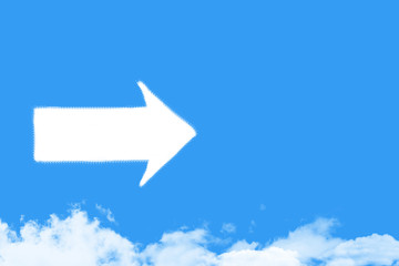 Arrow shaped cloud on blue sky