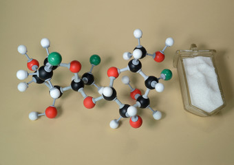 Molecule model of the sweetener Succralose (E955). White is Hydrogen, black is Carbon, red is...