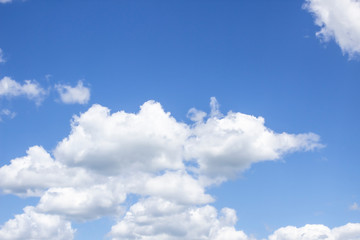 Naklejka na ściany i meble Cloud in the blue sky. A beautiful clouds against the blue sky background. Beautiful cloud pattern in the sky.