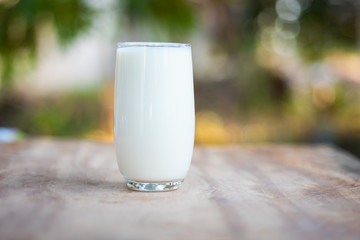 Glass of milk in drinking concept.