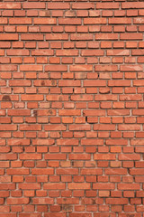 Old red brick wall for background