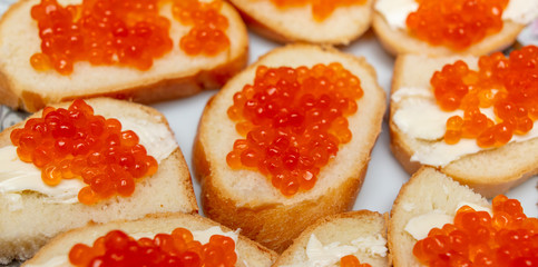 Bread with red caviar.