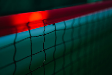 diagonal net of tennis with red stripe in green hard court, tennis compettion concept