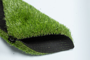 piece grass for football. On a white background, close-up