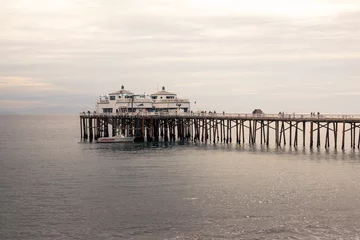 Gartenposter Malibu Beach pier in the coast of California, United States. © Jorge Argazkiak