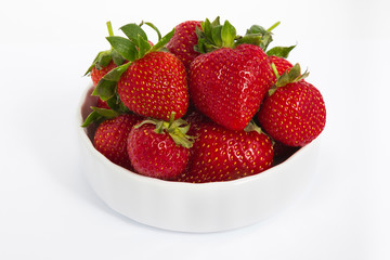 bowl with strawberries isolated on white background