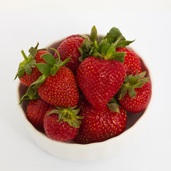 bowl with strawberries isolated on white background