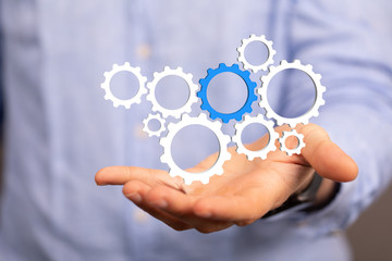 Business, Internet and technology concept. Business select gear icon on virtual screen.