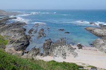beautiful bay in schoenmakerskop port elizabeth in calm conditions and small waves