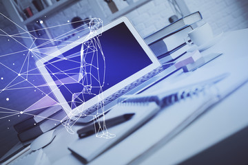 Fototapeta premium Desktop computer background in office and start up theme hologram drawing. Double exposure. Startup concept.