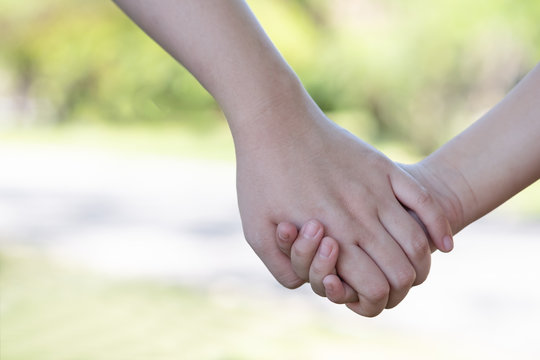 135 474 Best Parent And Child Holding Hand Images Stock Photos Vectors Adobe Stock