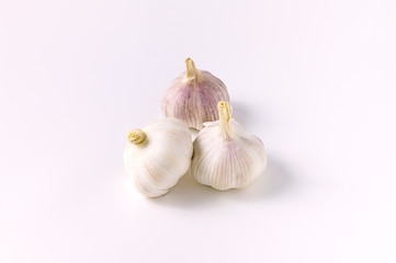 Garlic is a spice for cooking. On a white background.