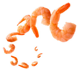 Boiled prawns levitate on a white background