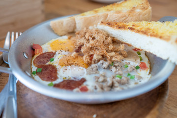 Fried egg with sausage Vietnamese style.