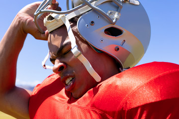 Football player with helmet