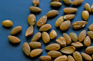 walnut almonds. isolate on blue  the background