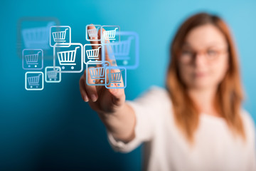 Businessman pressing modern technology panel shopping cart web phone credit card.