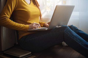 woman's hand using laptop payments, online shopping.