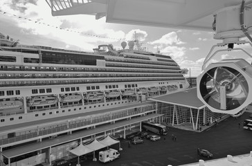 Huge modern cruiseships or cruise ship liners in Italian port of Savona at cruise terminal