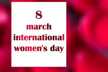 8 March International Woman Day phrase on beautiful blurred red background for greeting card. Copy space