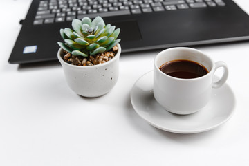 cup of coffee and laptop